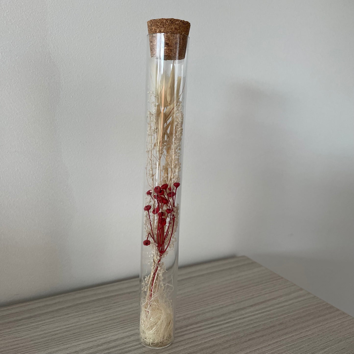 Staander met buisje en kaartje